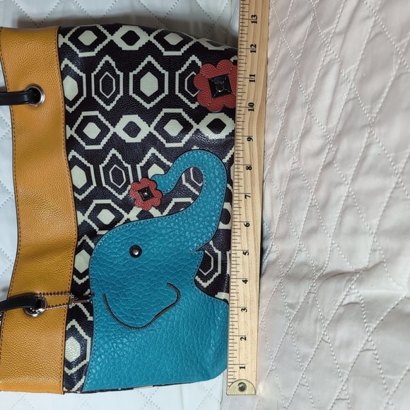 Relic Faux Leather Satchel and Wallet with Elephant/Floral Design. - Picture 14 of 16